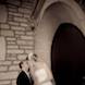 jefferson city missouri wedding photographer: bride groom kiss in church vestibule
